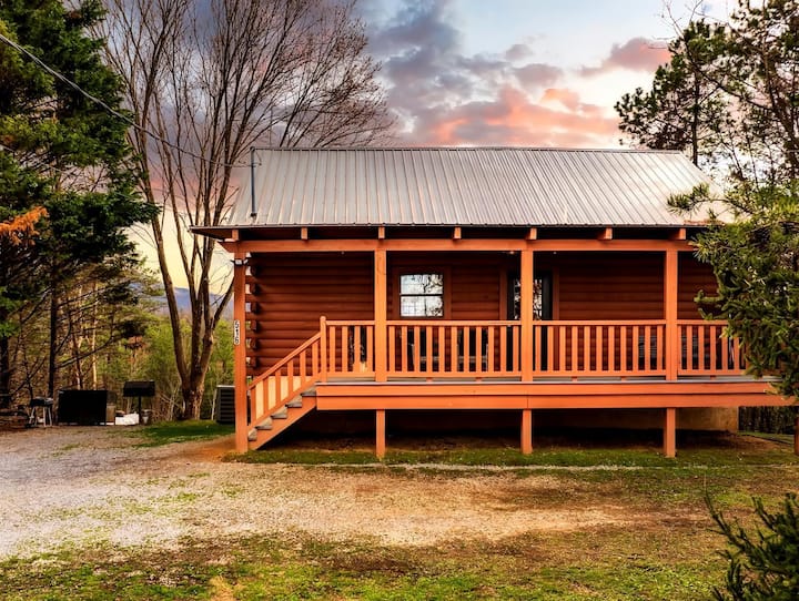 Wooden cabin with trees around